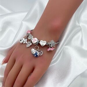 Linx Stainless Steel charm bracelet with Daughter and Sweet 16 Themed Charms